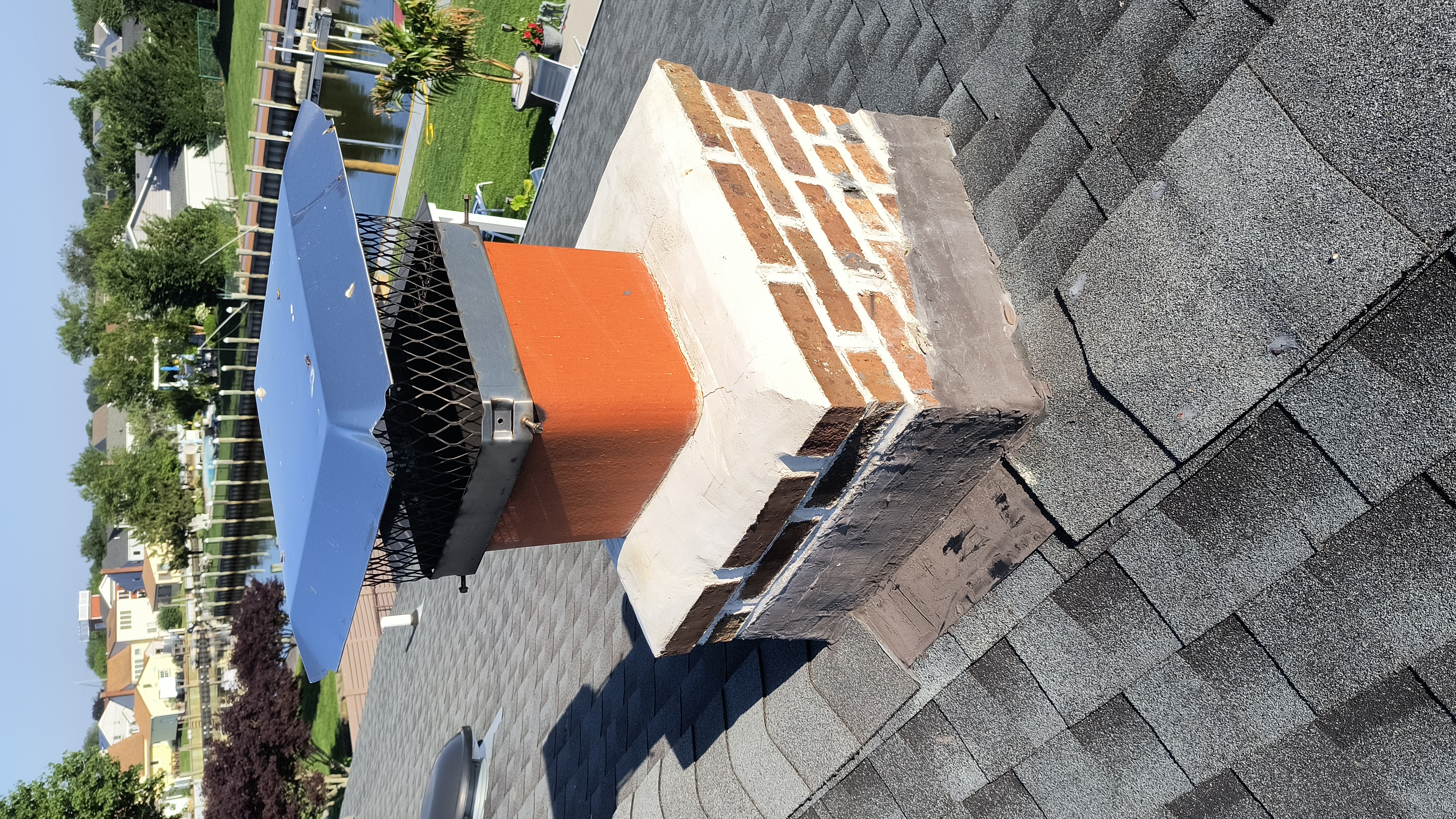 Full chimney masonry rebuild and restoration in Central Islip, NY