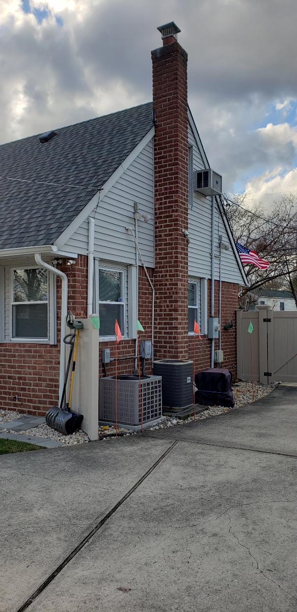 Professional chimney repointing restoring brick joints in Central Islip, NY