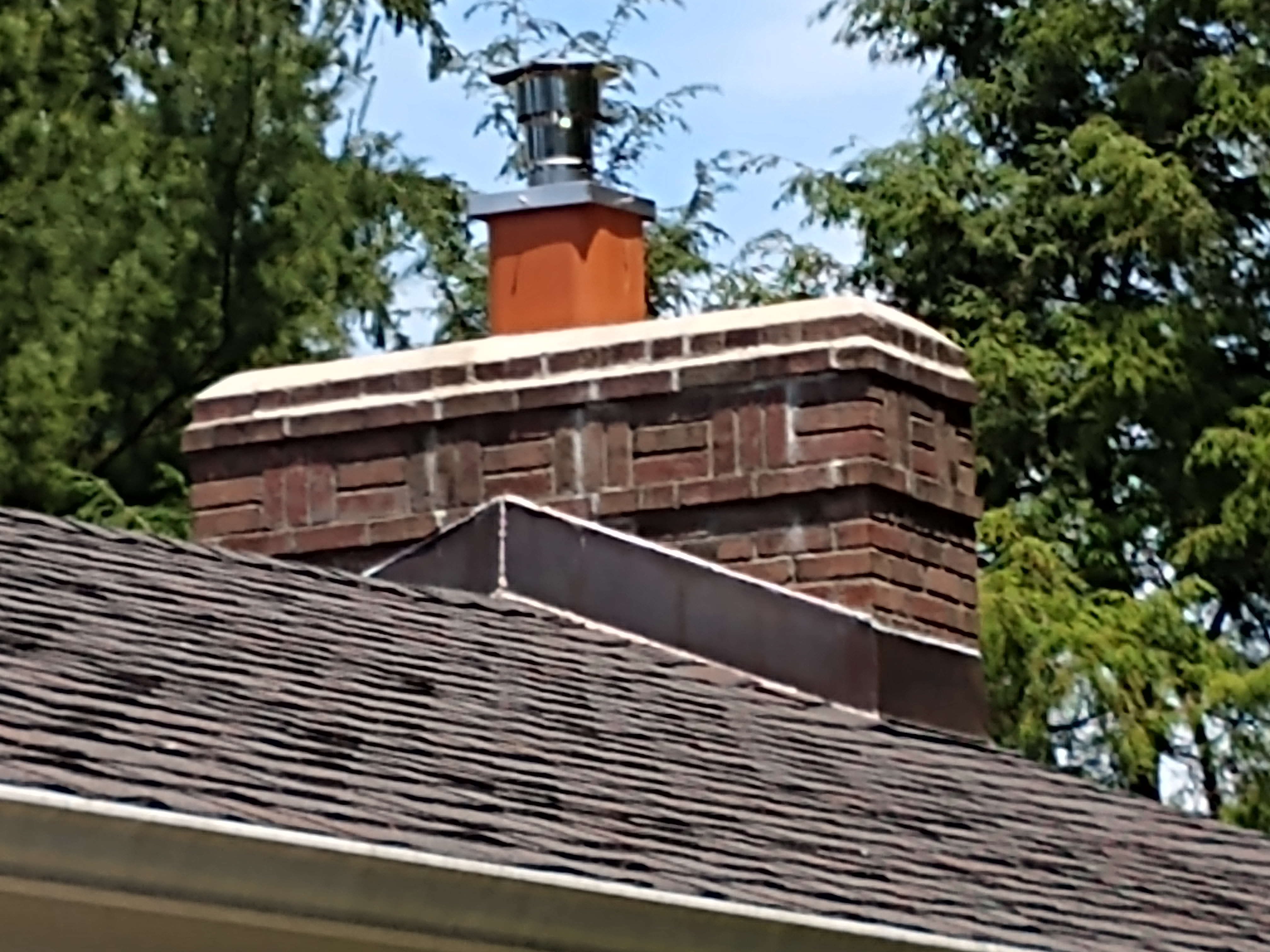 Stainless steel chimney cap with animal guard in Central Islip, New York